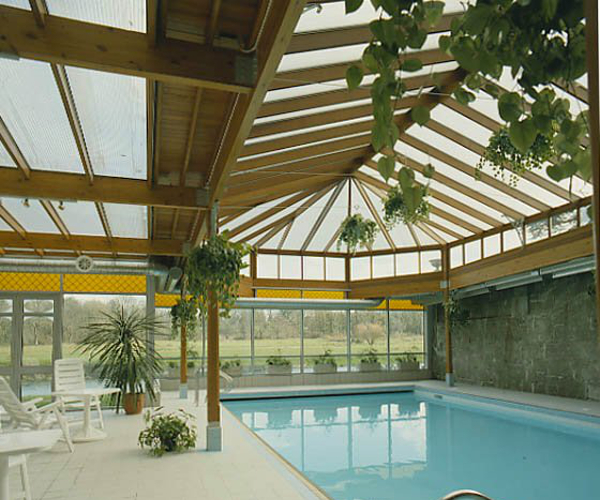 About-Norman-Pratt Timber Conservatory Swimming Pool Cover